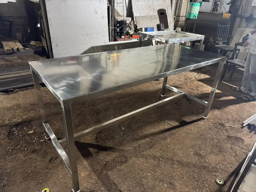 Long stainless steel preparation table fabricated in SS 304