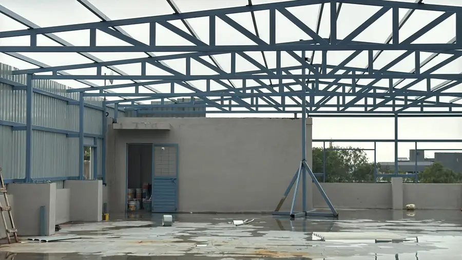 Truss canopy structure fabricated over a terrace slab