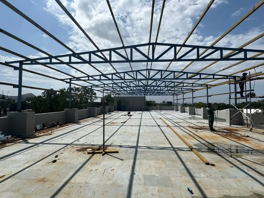 Wide-span shed roof frame fabricated and erected by Lalit Industries in Nashik